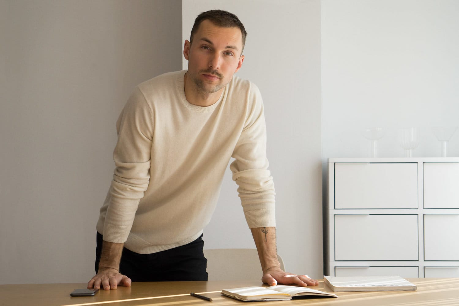 Portrait of designer Andres Reisinger in studio