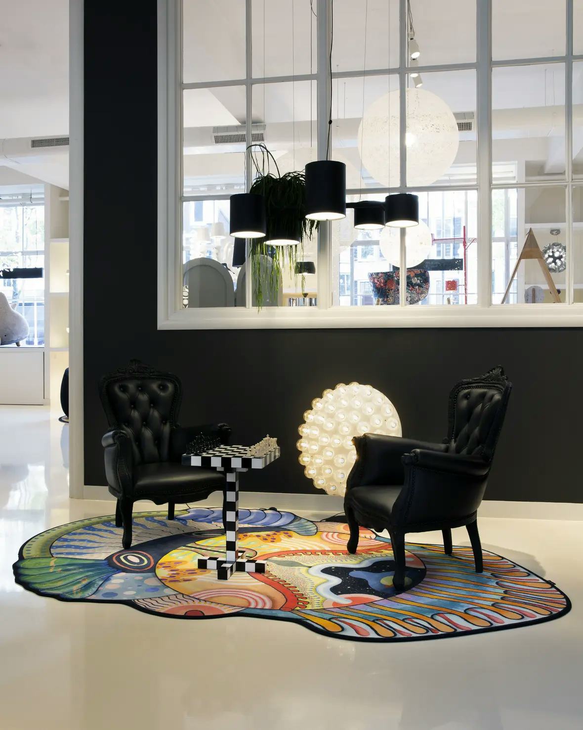 Interior of Amsterdam Showroom 2020 with Smoke Armchair, Chess Table and Prop Light Round Floor